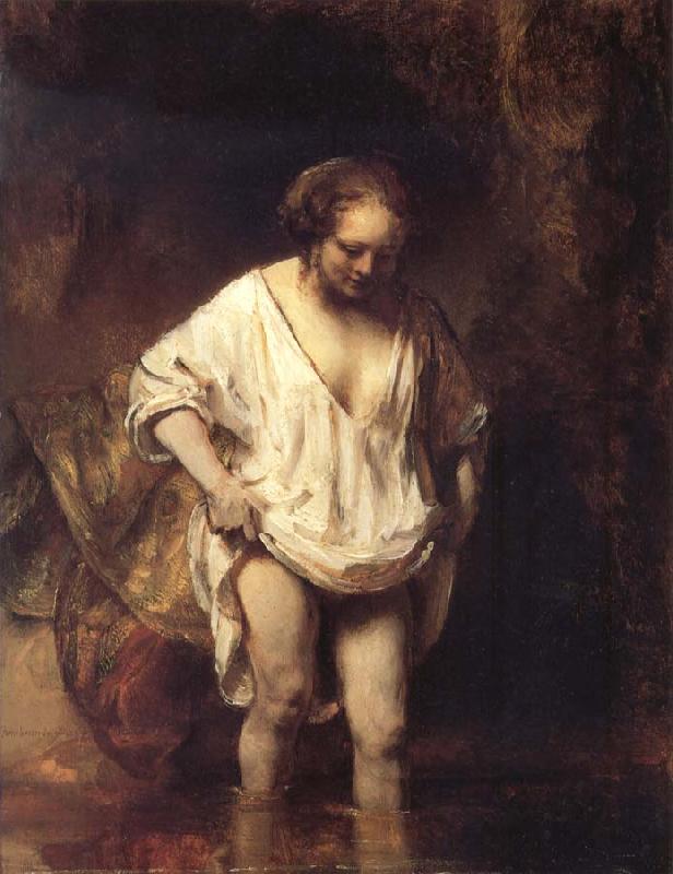 REMBRANDT Harmenszoon van Rijn Hendrickje Bathing in a River